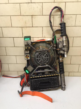 Illustration for article titled UPDATED: Paul Feig unveils updated Ghostbusters uniforms, proton pack